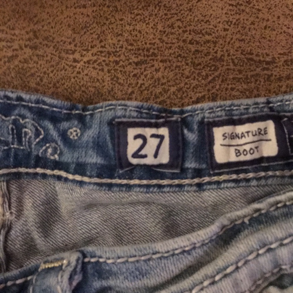 Faded ripped Miss me jeans